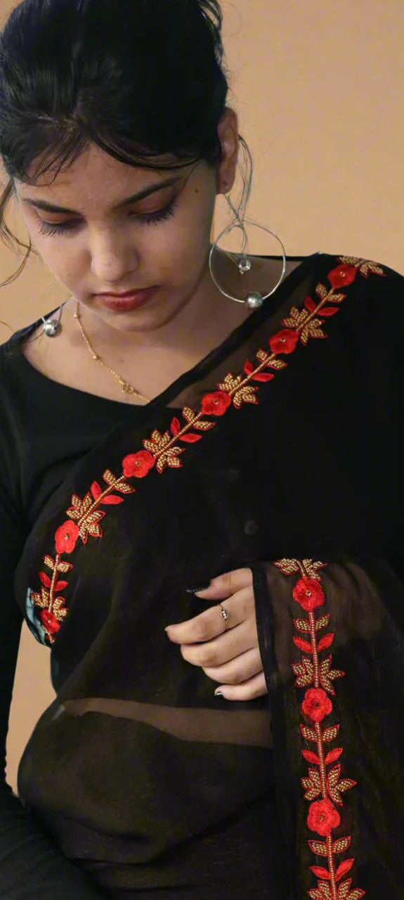 Black saree with red border