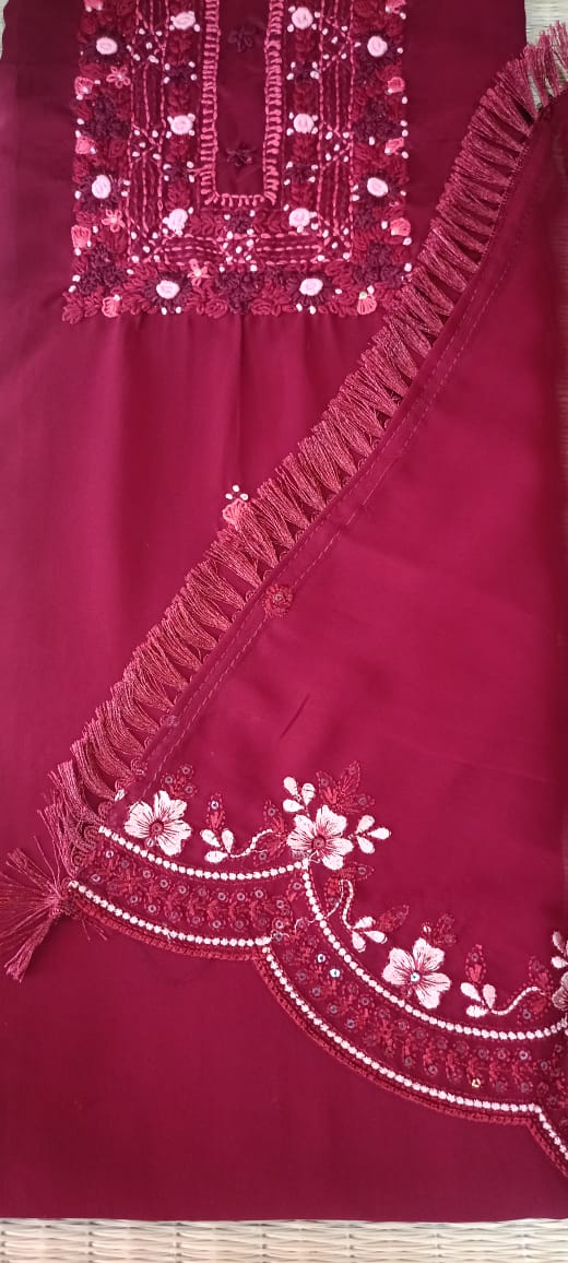 Deep red chiffon unstitched salwar set with thread work.