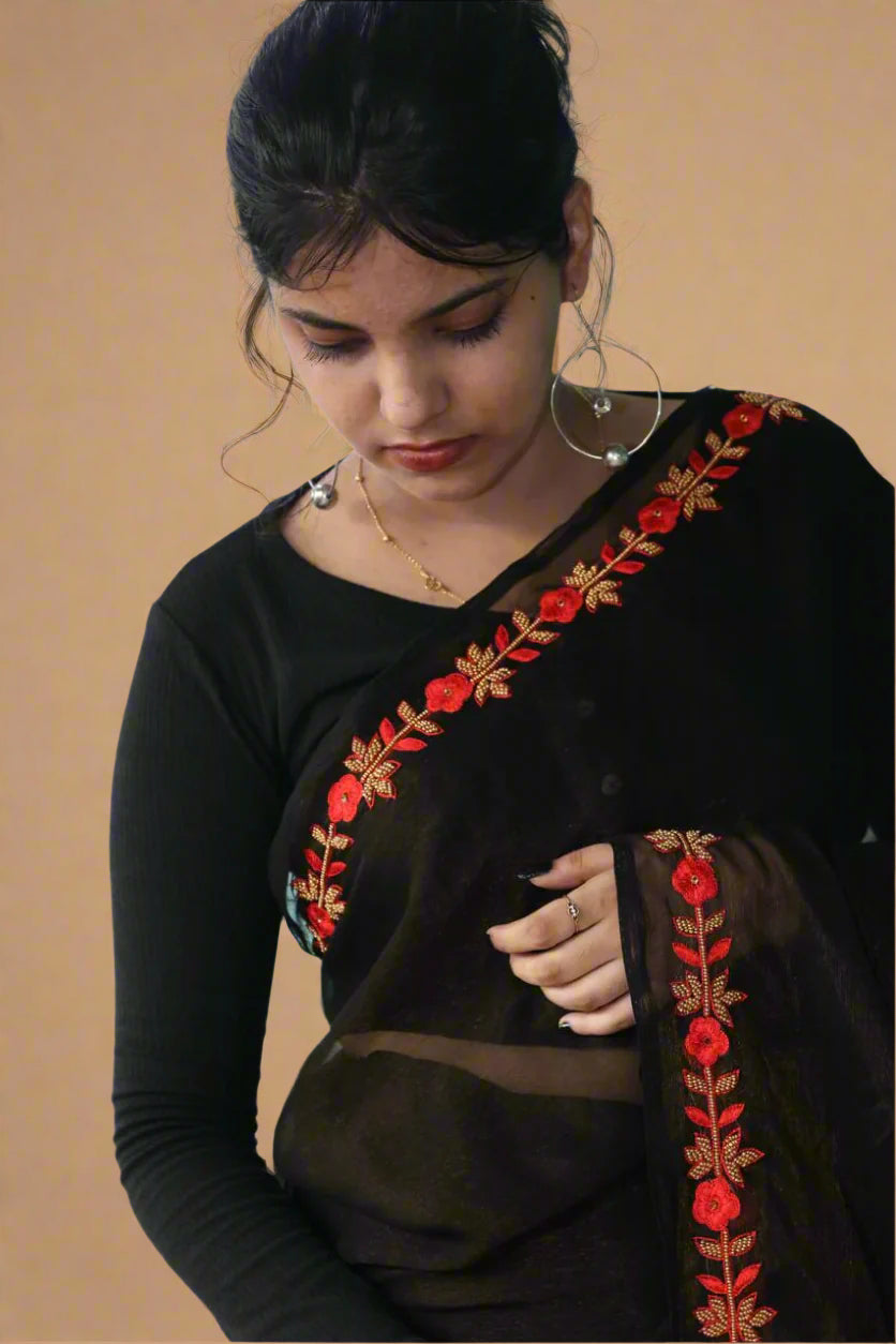 Black saree with red border