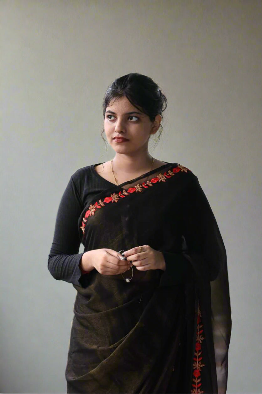 Black saree with red border