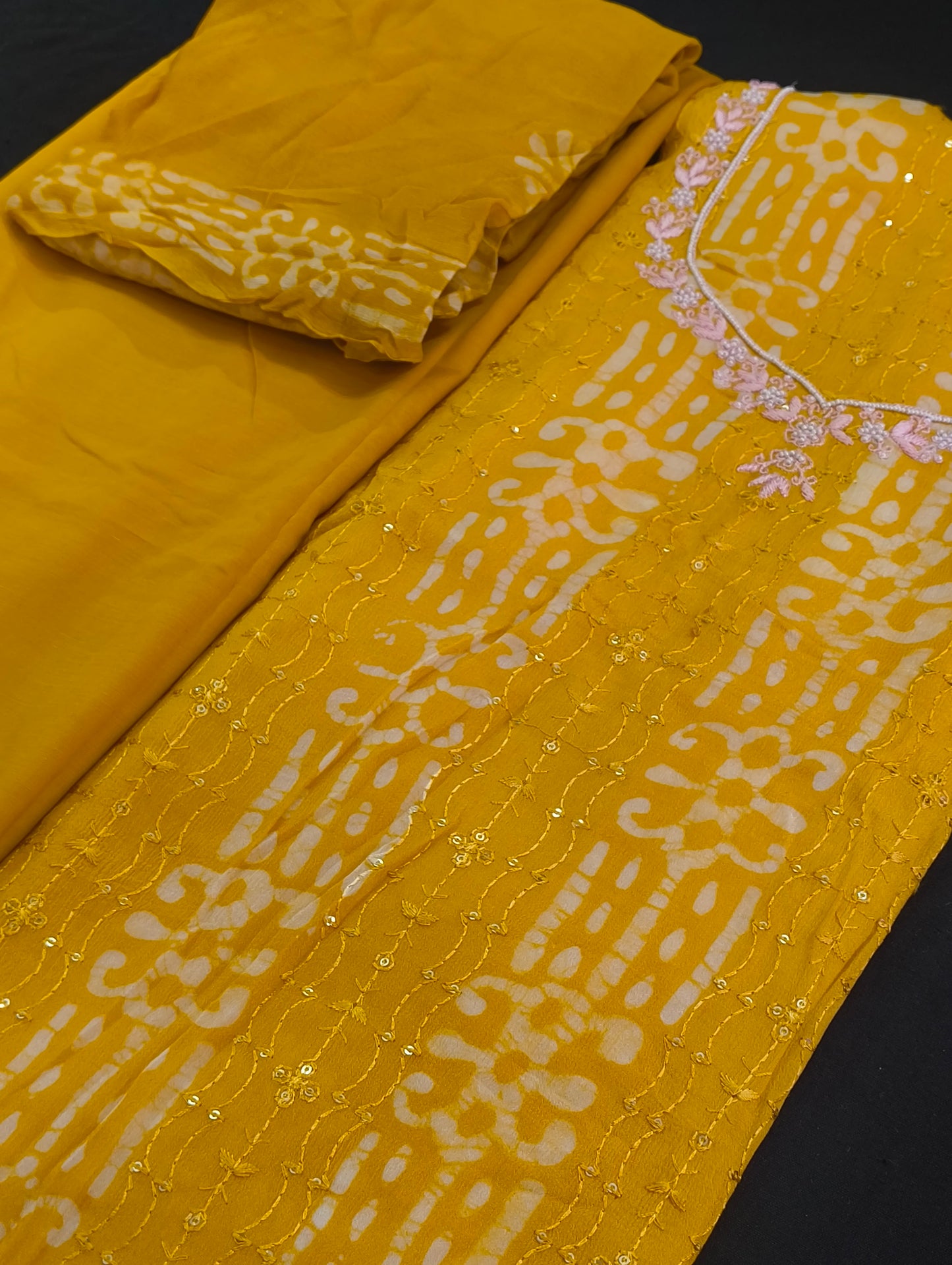 Semi silk material with thread work