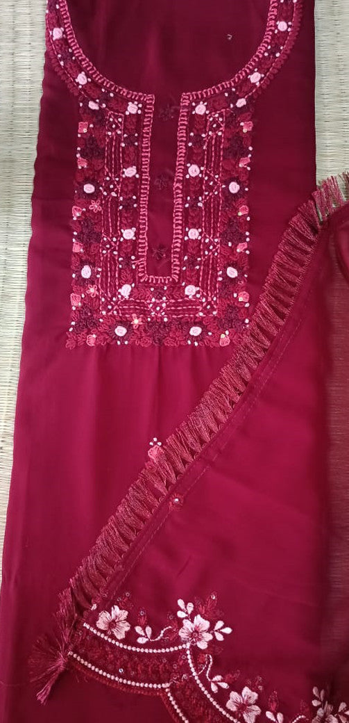 Deep red chiffon unstitched salwar set with thread work.