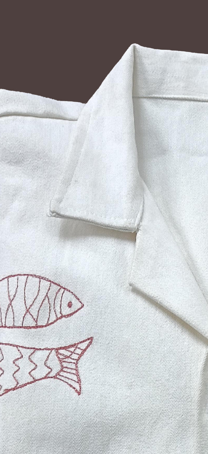 White shirt with fish embroidery