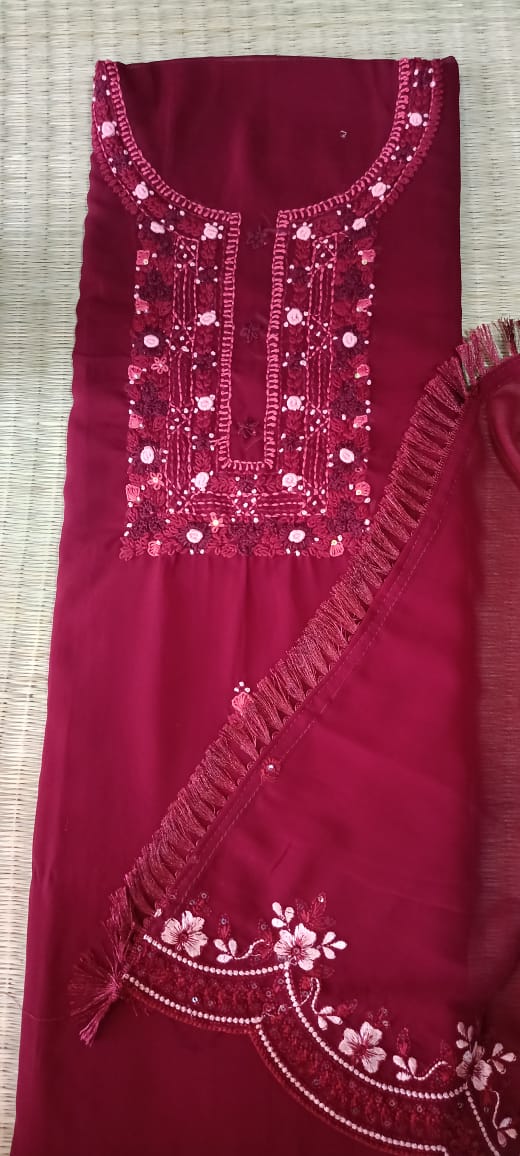Deep red chiffon unstitched salwar set with thread work.